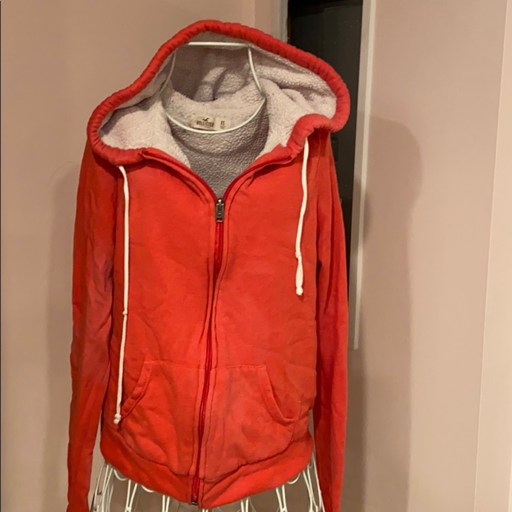 Peach/red jacket